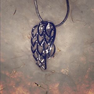 Angel wing cage necklace